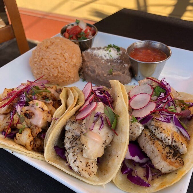 Grilled fish tacos with rice and beans
