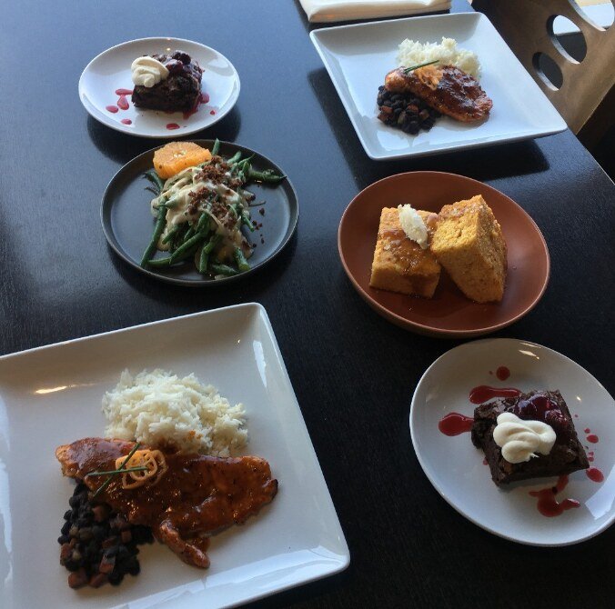 Plated seafood dishes overhead